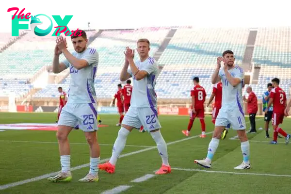 James Forrest, Ross McCrorie and Ryan Christie of Scotland applaud the fans prior to the international friendly match between Gibraltar and Scotlan...