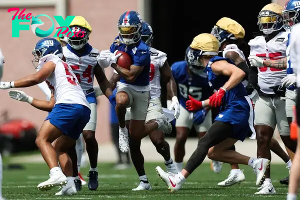 EAST RUTHERFORD, NEW JERSEY - JUNE 06: Wan'Dale Robinson #17 of the New York Giants participates in drills during New York Giants OTA Offseason Workouts at NY Giants Quest Diagnostics Training Center on June 06, 2024 in East Rutherford, New Jersey.   Luke Hales/Getty Images/AFP (Photo by Luke Hales / GETTY IMAGES NORTH AMERICA / Getty Images via AFP)