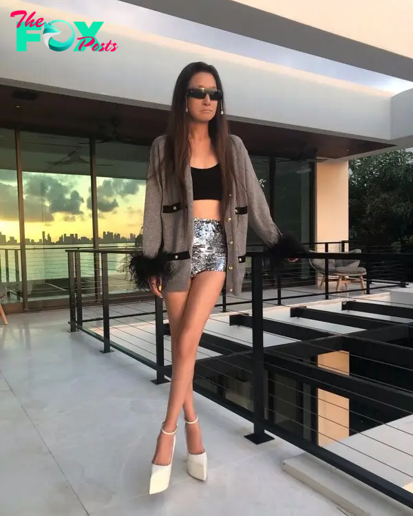 Vera Wang wearing sequin shorts