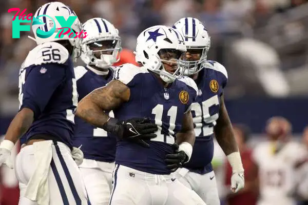 Nov 23, 2023; Arlington, Texas, USA; Dallas Cowboys linebacker Micah Parsons (11) celebrates a sack of Washington Commanders quarterback Sam Howell (not pictured) in the fourth quarter at AT&T Stadium. Mandatory Credit: Tim Heitman-USA TODAY Sports