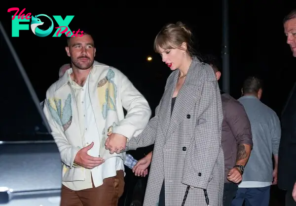 Travis Kelce and Taylor Swift holding hands