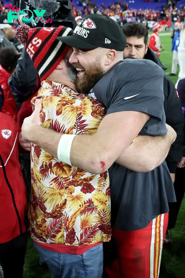 Travis Kelce and Jason Kelce hugging