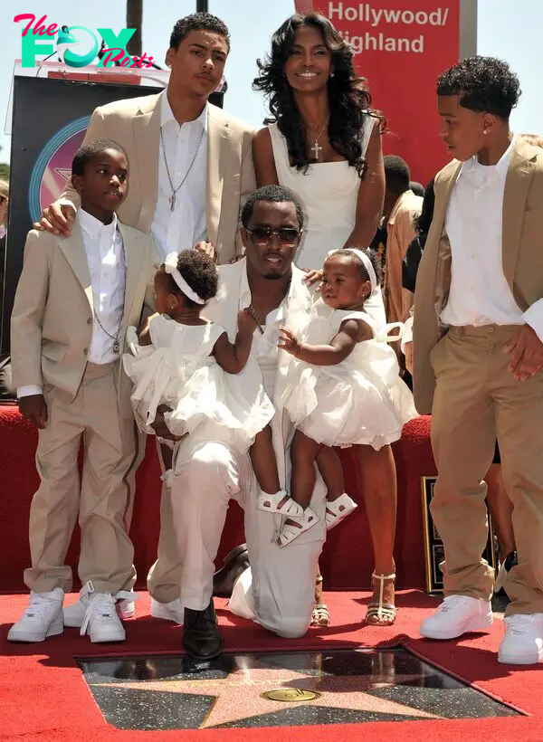 Sean "Diddy" Combs, Kim Porter and their kids.