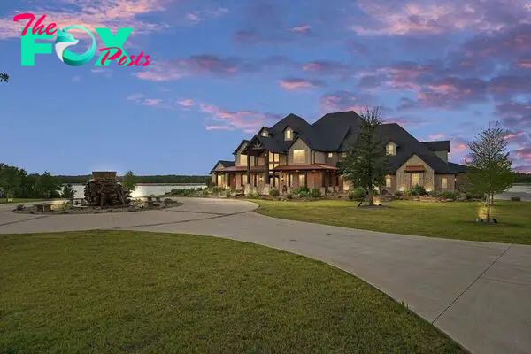 430 Chaparall Road Home in Ferris, Texas. Discover this breathtaking custom lake home nestled on 514 secluded acres, just 15 minutes south of Dallas. Meticulously constructed with stunning lake views from every room, this home features vaulted ceilings, a chef's dream kitchen, luxurious owner's suite, formal dining, study, and more. 