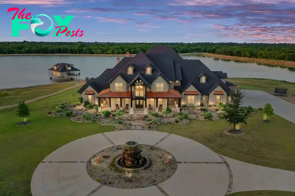 430 Chaparall Road Home in Ferris, Texas. Discover this breathtaking custom lake home nestled on 514 secluded acres, just 15 minutes south of Dallas. Meticulously constructed with stunning lake views from every room, this home features vaulted ceilings, a chef's dream kitchen, luxurious owner's suite, formal dining, study, and more. 