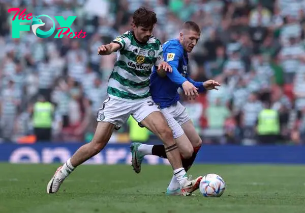 Matt O'Riley of Celtic vies with John Lundstram of Rangers during the Scottish Cup Final match between Celtic and Rangers at Hampden Park on May 25...