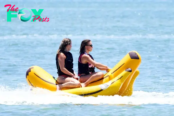 Sydney Sweeney and a friend on a banana boat.