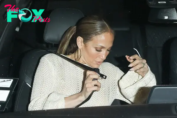 Jennifer Lopez in the car.