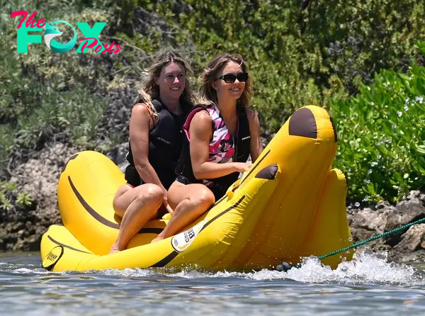 Sydney Sweeney and a friend on a banana boat.