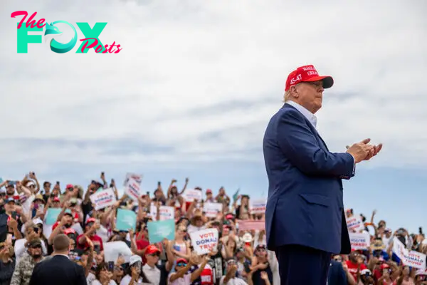 Republican presidential candidate, former U.S. President Donald Trump greets supporters upon arrival for his campaign rally at Sunset Park on June 9, 2024 in Las Vegas, Nev.