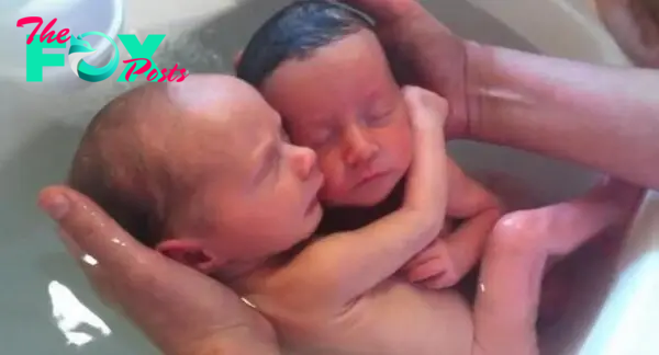 Newborn twins appear to hug each other during bath time [VIDEO] - UPI.com