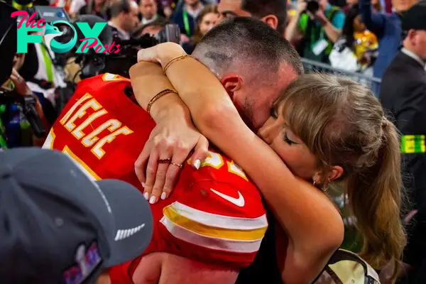 Travis Kelce celebrates with Taylor Swift after winning Super Bowl LVIII.