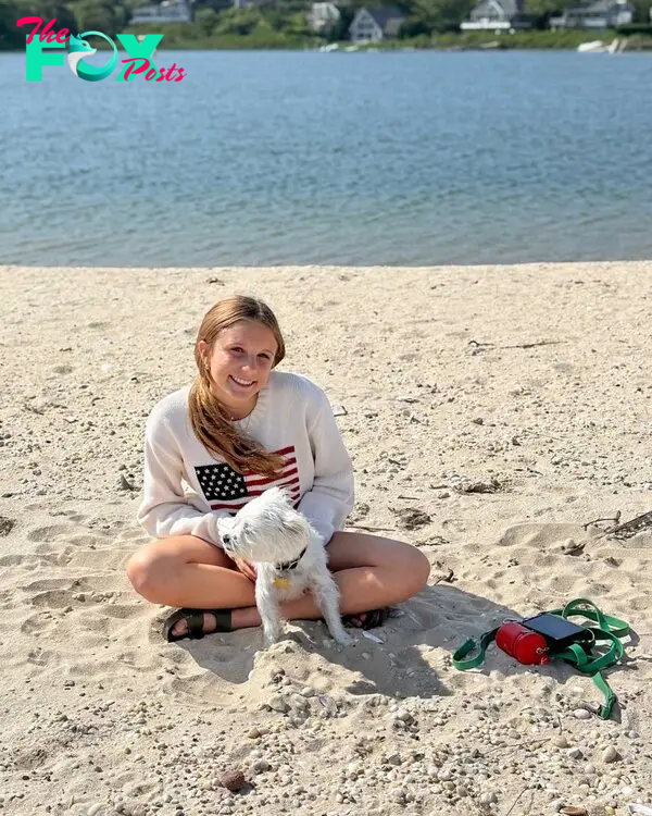 Bryn Hoppy with her dog in the Hamptons. 