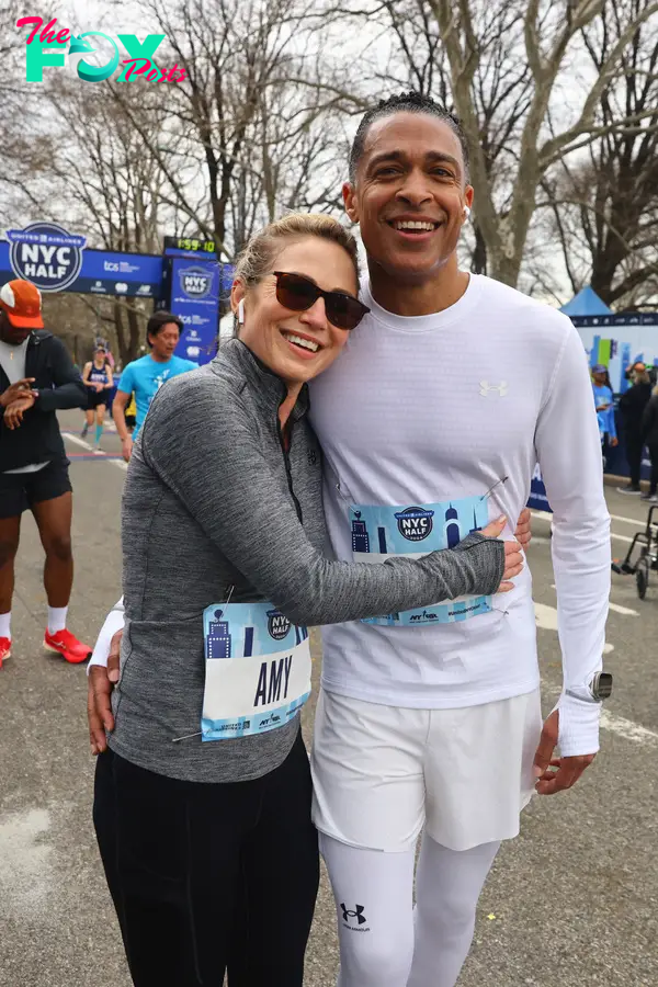 Amy Robach hugging TJ Holmes