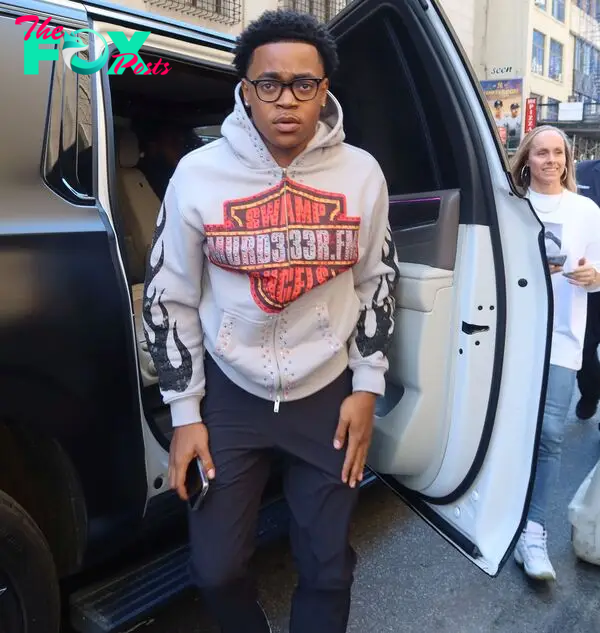 Michael Rainey Jr. getting out of a car.