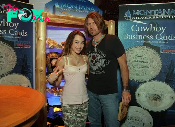 Miley Cyrus with Billy Ray Cyrus in 2006. 