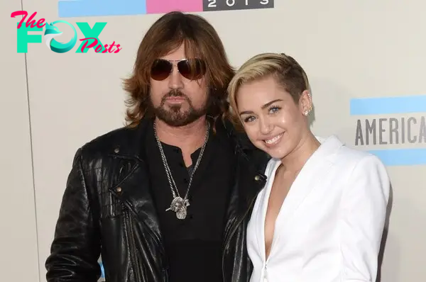 Miley Cyrus and Billy Ray Cyrus in 2013. 