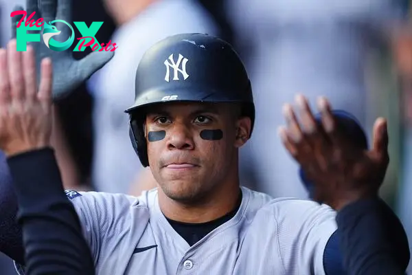 KANSAS CITY, MISSOURI - JUNE 11: Juan Soto #22 of the New York Yankees celebrates with teammates after scoring against the Kansas City Royals during the first inning at Kauffman Stadium on June 11, 2024 in Kansas City, Missouri.   Kyle Rivas/Getty Images/AFP (Photo by Kyle Rivas / GETTY IMAGES NORTH AMERICA / Getty Images via AFP)