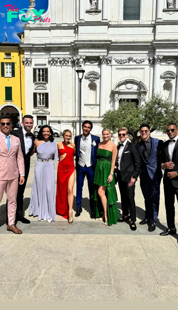 Andrea Denver posing at his wedding