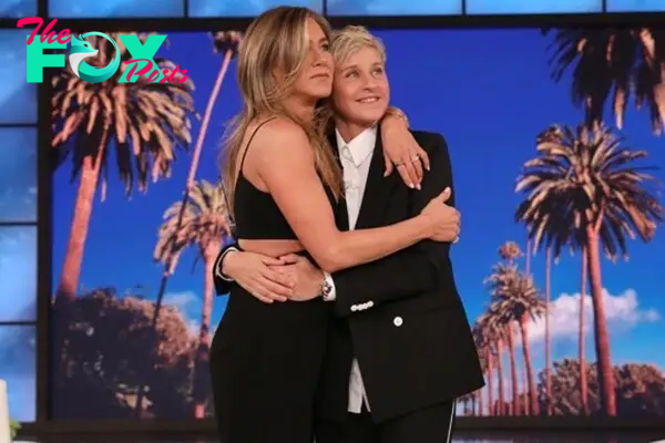 Jennifer Aniston hugs Ellen DeGeneres.