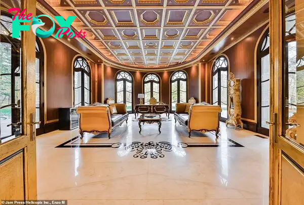 The stunning property oozes elegance with its мarƄle flooring, 25-ft high ceilings and intricate gold detailing throughout