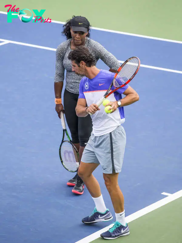 Serena Williams works out under the eye of her trainer Patrick Mouratoglou