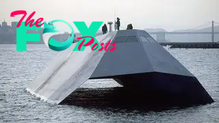 A picture of the U.S. navy’s experimental Sea Shadow ship, which is metallic and angular.
