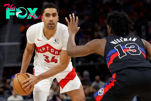  Toronto Raptors center Jontay Porter (34) is defended by Detroit Pistons center James Wiseman (13) 