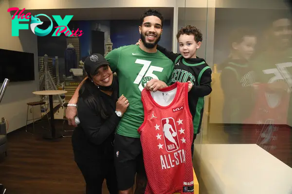 Jayson Tatum with his mom and his son in 2022.