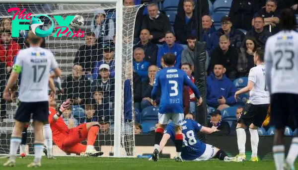 Jordan McGhee of Dundee Scores his teams 1st goal during the Cinch Scottish Premiership match between Rangers FC and Dundee FC at Ibrox Stadium on ...