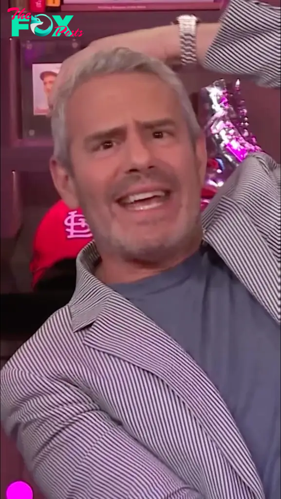 Andy Cohen being hit with a bottle on "Watch What Happens Live with Andy Cohen." 