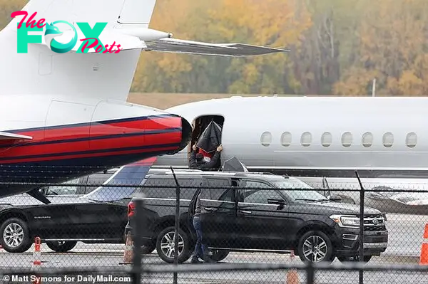 She has been slammed for the lavish travel habit due to her jet's inevitable release of carbon dioxide emissions into the atmosphere, which are extremely harmful to the environment (pictured boarding jet in October)