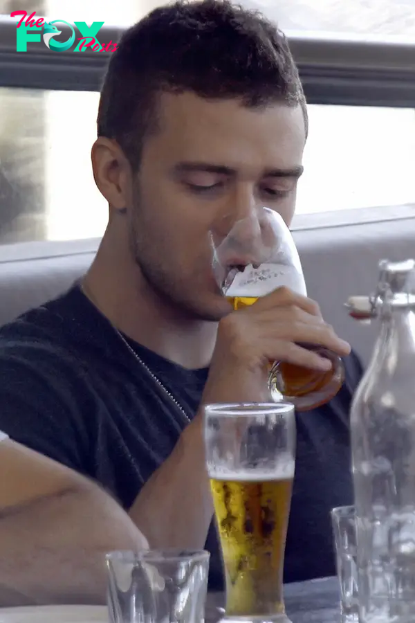 Justin Timberlake drinking a beer