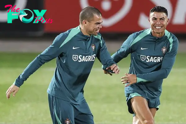 Cristiano Ronaldo (R) and Pepe of Portugal 