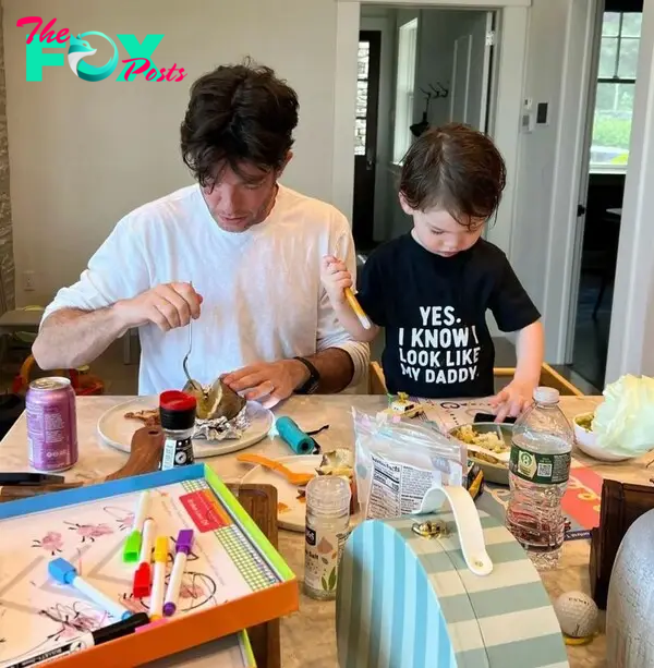 John Mulaney eating with his son Malcolm on Father's Day. 
