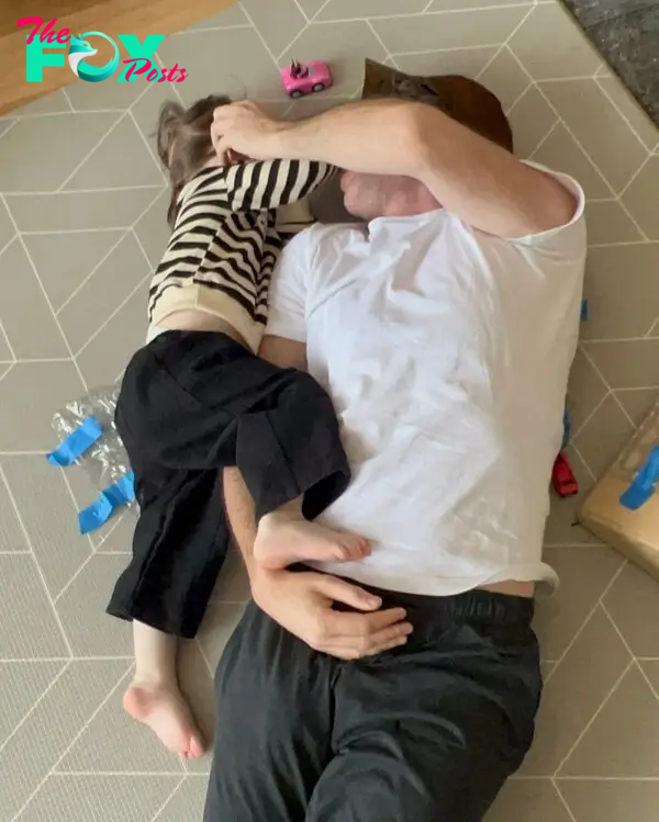 John Mulaney playing with his son Malcolm. 