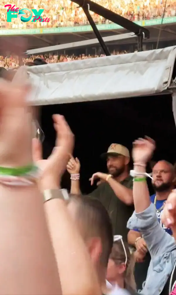 Travis Kelce dancing at Taylor Swift's concert in London