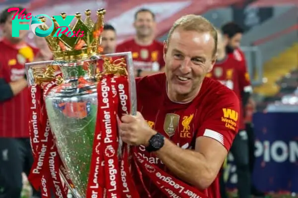 LIVERPOOL, ENGLAND - Wednesday, July 22, 2020: Liverpool’s player liaison officer Ray Haughan poses with the Premier League trophy as the Reds are crowned Champions after the FA Premier League match between Liverpool FC and Chelsea FC at Anfield. The game was played behind closed doors due to the UK government’s social distancing laws during the Coronavirus COVID-19 Pandemic. (Pic by David Rawcliffe/Propaganda)