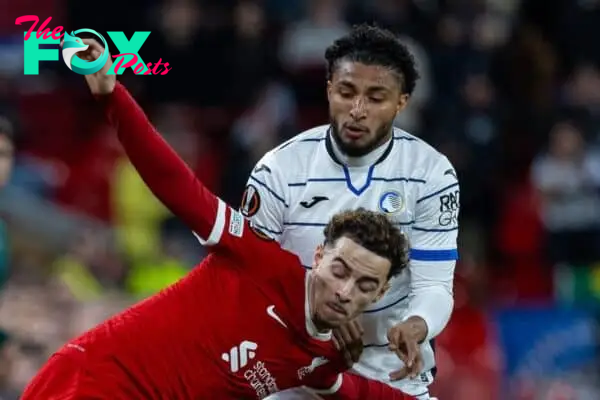 LIVERPOOL, ENGLAND - Thursday, April 11, 2024: Liverpool's Curtis Jones (L) is challenged by Atalanta's Éderson José dos Santos Lourenço da Silva during the UEFA Europa League Quarter-Final 1st Leg match between Liverpool FC and BC Atalanta at Anfield. Atalanta won 3-0. (Photo by David Rawcliffe/Propaganda)