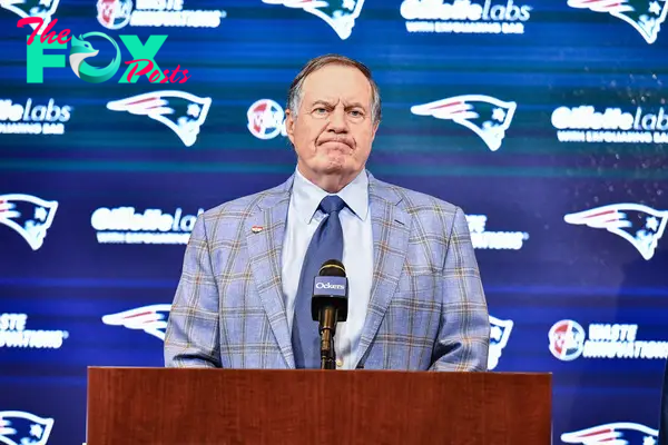 Bill Belichick at a podium.