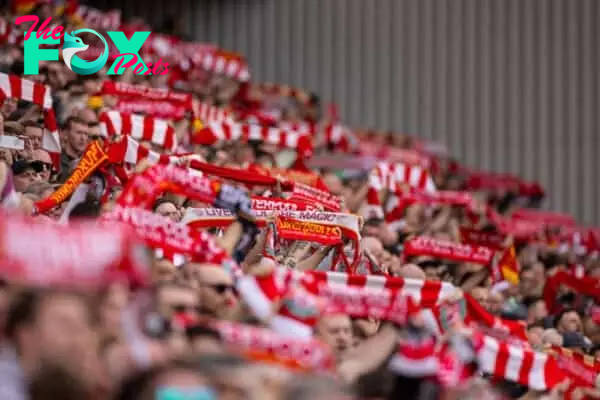 LIVERPOOL, ENGLAND - Sunday, May 5, 2024: Liverpool supporter sing "You'll Never Walk Alone" before the FA Premier League match between Liverpool FC and Tottenham Hotspur FC at Anfield. Liverpool won 4-2. (Photo by Ryan Brown/Propaganda)
