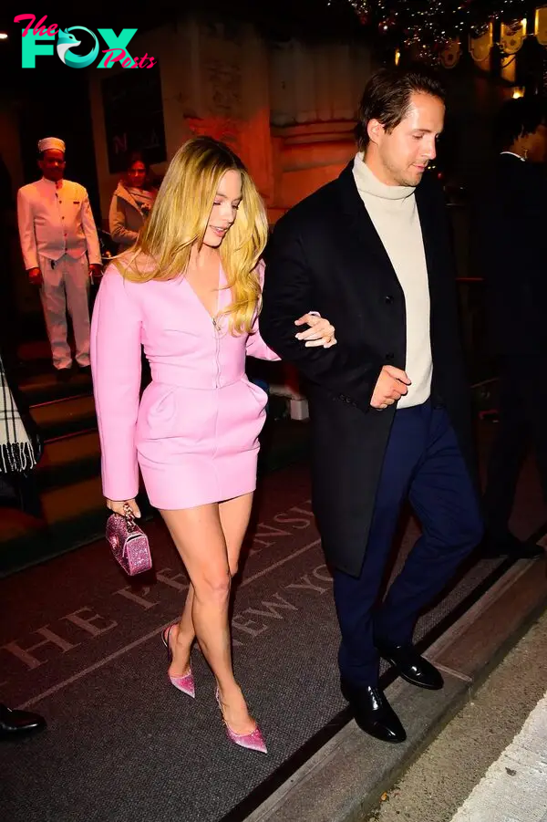 Margot Robbie and Tom Ackerley are seen in midtown on November 28, 2023 in New York City.