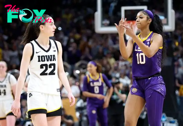 Angel Reese (10) gestures to Caitlin Clark (22) after the game during the final round of the Women's Final Four.