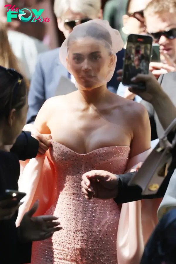 Kylie Jenner in a pink Schiaparelli dress. 