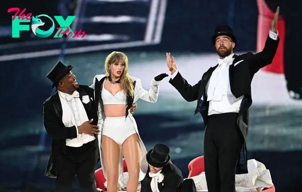 Taylor Swift and Travis Kelce on stage