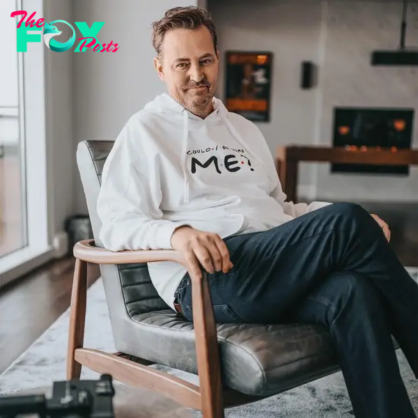 Matthew Perry sitting