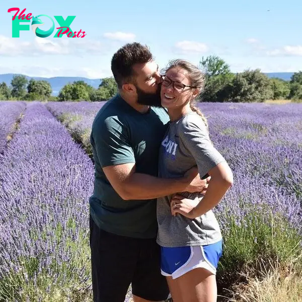 jason kelce kissing kylie kelce in a lavender field