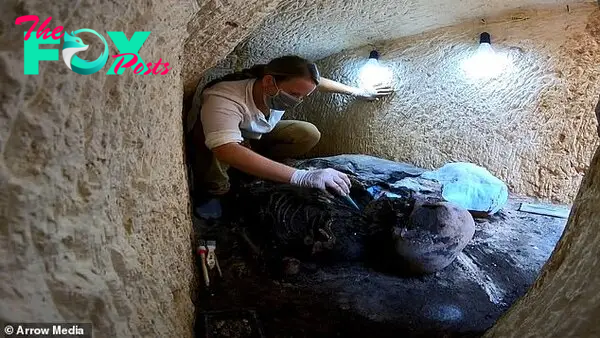 Osteoarchaeologist, Dr Linda Chapon, working to conserve the two mummies found inside a sealed tomb at Taposiris Magna
