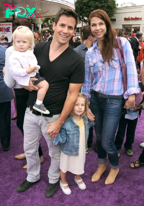 Christian Oliver and his daughters. 