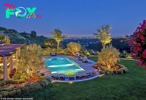 Take a dip: Aмenities include an enorмous outdoor swiммing pool surrounded Ƅy a wide stretch of lawn